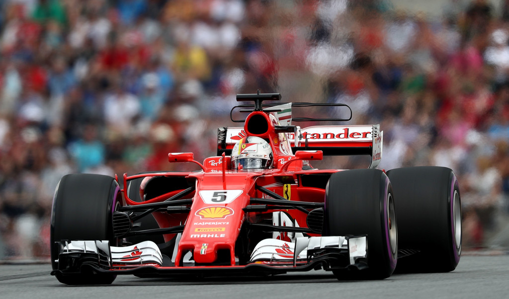Sebastian Vettel of Germany driving the (5) Scuderia Ferrari SF70H on track during qualifying for the Formula One Grand Prix of Austria at Red Bull Ring on July 8, 2017 in Spielberg, Austria. Sebastian Vettel of Germany driving the (5) Scuderia Ferrari SF70H on track during qualifying for the Formula One Grand Prix of Austria at Red Bull Ring on July 8, 2017 in Spielberg, Austria.