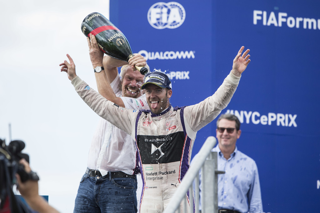 Sir Richard Branson and Sam Bird (GBR), DS Virgin Racing, Spark-Citroen, Virgin DSV-02, spray the champagne on the podium during the New York City ePrix, ninth round of the 2016/17 FIA Formula E Series on July 15, 2017 in Brooklyn, New York City, NY, USA. Sir Richard Branson and Sam Bird (GBR), DS Virgin Racing, Spark-Citroen, Virgin DSV-02, spray the champagne on the podium during the New York City ePrix, ninth round of the 2016/17 FIA Formula E Series on July 15, 2017 in Brooklyn, New York City, NY, USA.