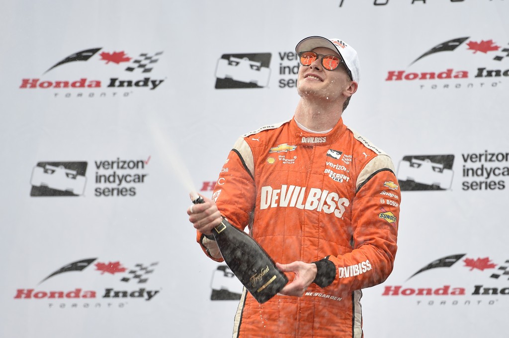 Josef Newgarden celebrates his victory in-Torontos victory circle, 2017 IndyCar. Josef Newgarden celebrates his victory in-Torontos victory circle, 2017 IndyCar.