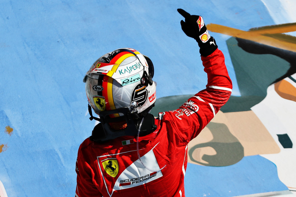 Race winner Sebastian Vettel of Germany and Ferrari celebrates his win in parc ferme during the Formula One Grand Prix of Hungary at Hungaroring on July 30, 2017 in Budapest, Hungary.
Race winner Sebastian Vettel of Germany and Ferrari celebrates his win in parc ferme during the Formula One Grand Prix of Hungary at Hungaroring on July 30, 2017 in Budapest, Hungary.