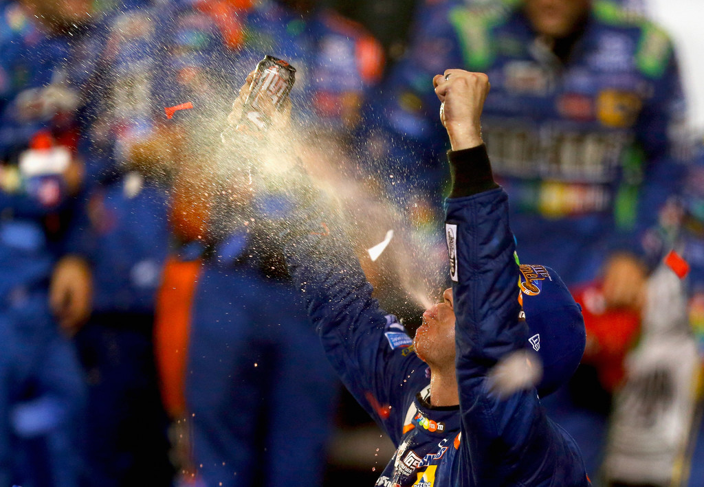 Kyle Busch, driver of the #18 M&M's Caramel Toyota, celebrates in Victoy Lane after winning the Monster Energy NASCAR Cup Series Bass Pro Shops NRA Night Race at Bristol Motor Speedway on August 19, 2017 in Bristol, Tennessee. Kyle Busch, driver of the #18 M&M's Caramel Toyota, celebrates in Victoy Lane after winning the Monster Energy NASCAR Cup Series Bass Pro Shops NRA Night Race at Bristol Motor Speedway on August 19, 2017 in Bristol, Tennessee.