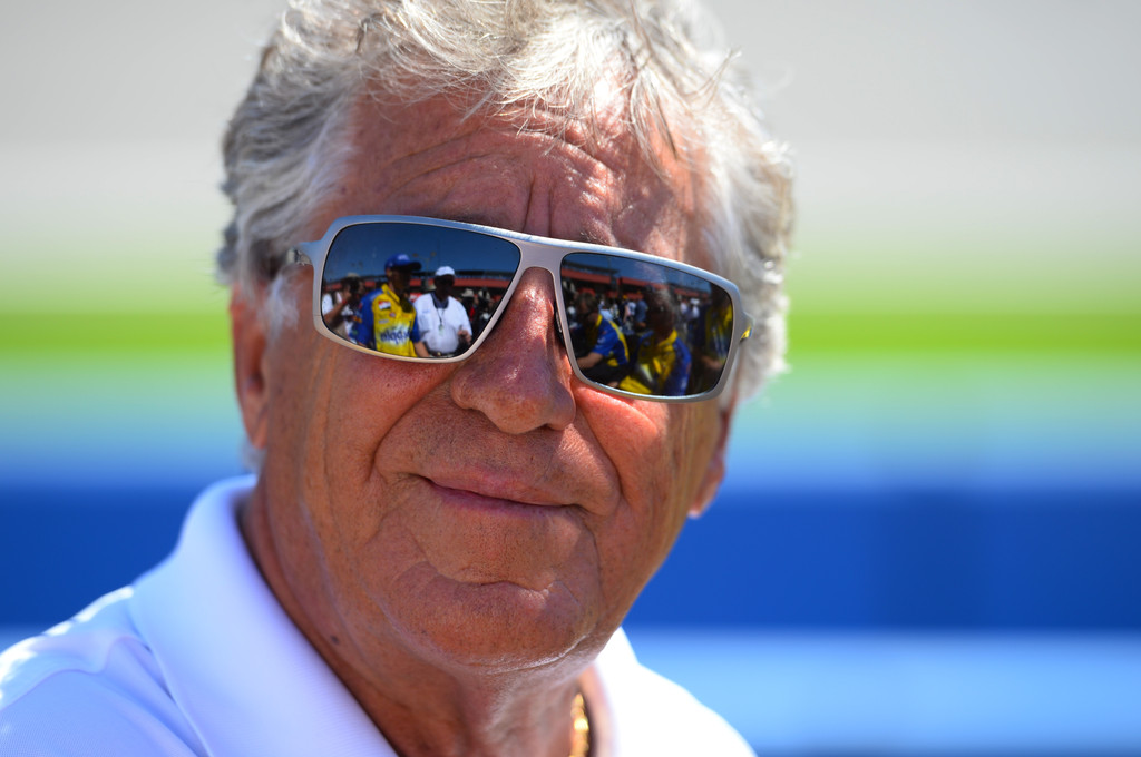 Racing legend Mario Andretti during qualifying for the Verizon IndyCar Series MAVTV 500 IndyCar World Championship Race at the Auto Club Speedway on August 29, 2014 in Fontana, California. Racing legend Mario Andretti during qualifying for the Verizon IndyCar Series MAVTV 500 IndyCar World Championship Race at the Auto Club Speedway on August 29, 2014 in Fontana, California.