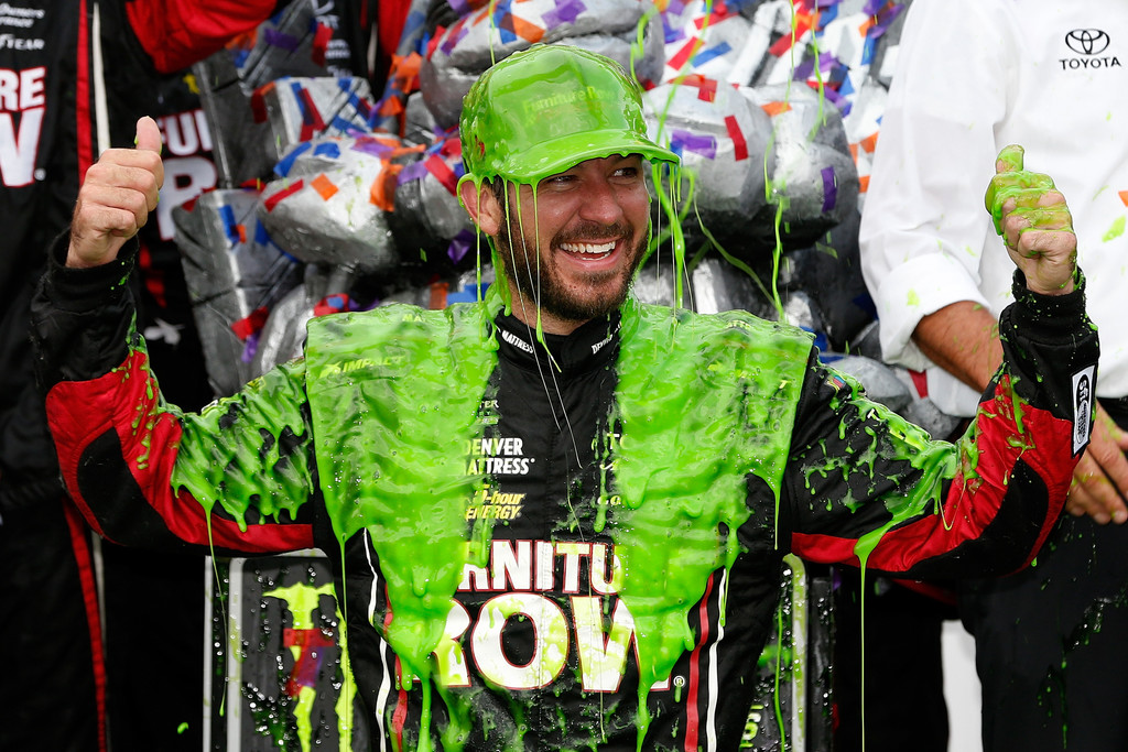 Martin Truex Jr., driver of the #78 Furniture Row/Denver Mattress Toyota, celebrates in Victory Lane after winning during the Monster Energy NASCAR Cup Series Tales of the Turtles 400 at Chicagoland Speedway on September 17, 2017 in Joliet, Illinois. Martin Truex Jr., driver of the #78 Furniture Row/Denver Mattress Toyota, celebrates in Victory Lane after winning during the Monster Energy NASCAR Cup Series Tales of the Turtles 400 at Chicagoland Speedway on September 17, 2017 in Joliet, Illinois.