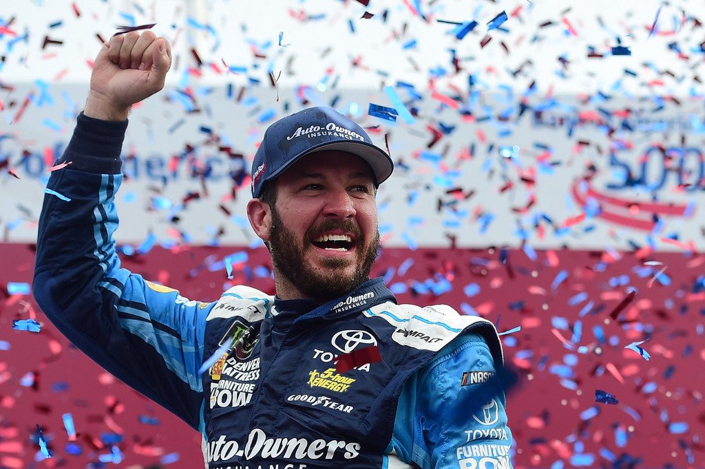 Martin Truex Jr, driver of the #78 Auto-Owners Insurance Toyota, celebrates in Victory Lane after winning the Monster Energy NASCAR Cup Series Bank of America 500 at Charlotte Motor Speedway on October 8, 2017 in Charlotte, North Carolina. Martin Truex Jr, driver of the #78 Auto-Owners Insurance Toyota, celebrates in Victory Lane after winning the Monster Energy NASCAR Cup Series Bank of America 500 at Charlotte Motor Speedway on October 8, 2017 in Charlotte, North Carolina.