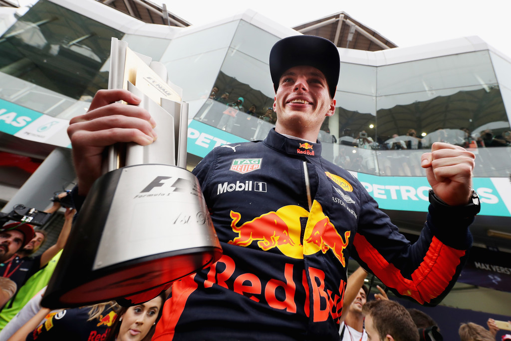 Race winner Max Verstappen of Netherlands and Red Bull Racing celebrates with his team during the Malaysia Formula One Grand Prix at Sepang Circuit on October 1, 2017 in Kuala Lumpur, Malaysia. Race winner Max Verstappen of Netherlands and Red Bull Racing celebrates with his team during the Malaysia Formula One Grand Prix at Sepang Circuit on October 1, 2017 in Kuala Lumpur, Malaysia.
