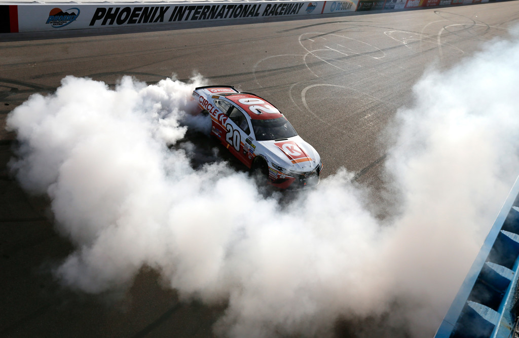 Matt Kenseth, driver of the #20 Circle K Toyota, celebrates with a burnout after winning the Monster Energy NASCAR Cup Series Can-Am 500 at Phoenix International Raceway on November 12, 2017 in Avondale, Arizona. Matt Kenseth, driver of the #20 Circle K Toyota, celebrates with a burnout after winning the Monster Energy NASCAR Cup Series Can-Am 500 at Phoenix International Raceway on November 12, 2017 in Avondale, Arizona.