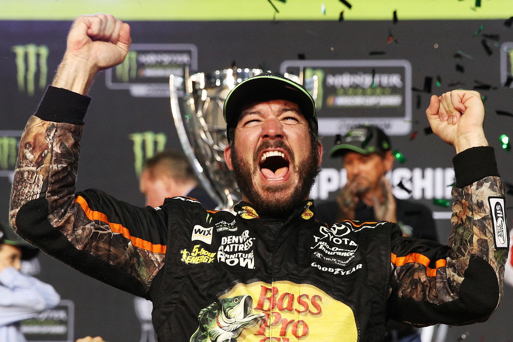 Martin Truex Jr., driver of the #78 Bass Pro Shops/Tracker Boats Toyota, in Victory Lane after winning the Monster Energy NASCAR Cup Series Championship and the Monster Energy NASCAR Cup Series Championship Ford EcoBoost 400 at Homestead-Miami Speedway on November 19, 2017 in Homestead, Florida. Martin Truex Jr., driver of the #78 Bass Pro Shops/Tracker Boats Toyota, in Victory Lane after winning the Monster Energy NASCAR Cup Series Championship and the Monster Energy NASCAR Cup Series Championship Ford EcoBoost 400 at Homestead-Miami Speedway on November 19, 2017 in Homestead, Florida.