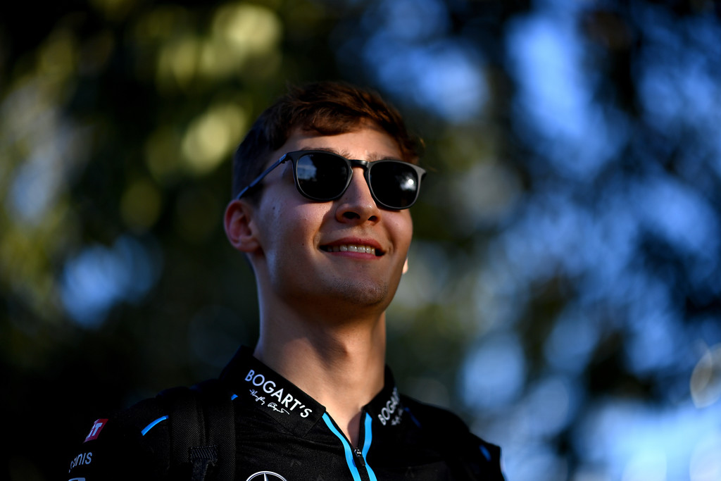 George Russell of Great Britain and Williams looks on in the Paddock during previews ahead of the F1 Grand Prix of Australia at Melbourne Grand Prix Circuit on March 12, 2020 in Melbourne, Australia. George Russell of Great Britain and Williams looks on in the Paddock during previews ahead of the F1 Grand Prix of Australia at Melbourne Grand Prix Circuit on March 12, 2020 in Melbourne, Australia.