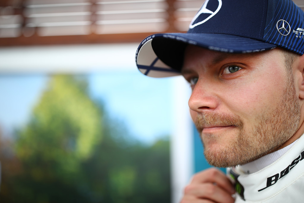 Valtteri Bottas of Finland and Mercedes GP looks on as he walks through the paddock during previews ahead of the F1 Grand Prix of Australia at Melbourne Grand Prix Circuit on March 12, 2020 in Melbourne, Australia. Valtteri Bottas of Finland and Mercedes GP looks on as he walks through the paddock during previews ahead of the F1 Grand Prix of Australia at Melbourne Grand Prix Circuit on March 12, 2020 in Melbourne, Australia.