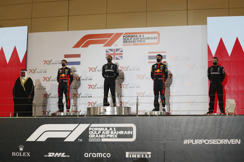 Race winner Lewis Hamilton of Great Britain and Mercedes GP, second placed Max Verstappen of Netherlands and Red Bull Racing and third placed Alexander Albon of Thailand and Red Bull Racing stand on the podium during the F1 Grand Prix of Bahrain at Bahrain International Circuit on November 29, 2020 in Bahrain, Bahrain. Race winner Lewis Hamilton of Great Britain and Mercedes GP, second placed Max Verstappen of Netherlands and Red Bull Racing and third placed Alexander Albon of Thailand and Red Bull Racing stand on the podium during the F1 Grand Prix of Bahrain at Bahrain International Circuit on November 29, 2020 in Bahrain, Bahrain.