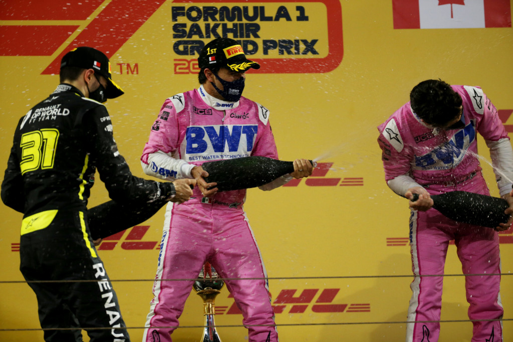 The podium: Sergio Perez Racing Point F1 Team, race winner; Esteban Ocon Renault F1 Team, second; Lance Stroll Racing Point F1 Team, third. Sakhir Grand Prix, Sunday 6th December 2020. Sakhir, Bahrain. The podium: Sergio Perez Racing Point F1 Team, race winner; Esteban Ocon Renault F1 Team, second; Lance Stroll Racing Point F1 Team, third. Sakhir Grand Prix, Sunday 6th December 2020. Sakhir, Bahrain.
